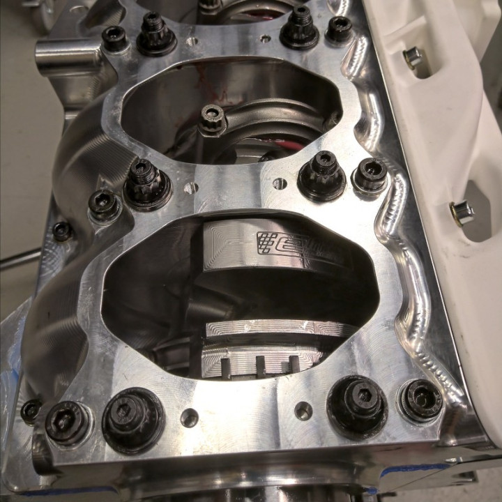 Rex crankcase service opening. Connecting rod big end removable with no oil system disassembly.